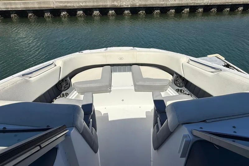 Slide: The Image of 2020 Cobalt CS23 boat interior with spacious seating and water view. - 6
