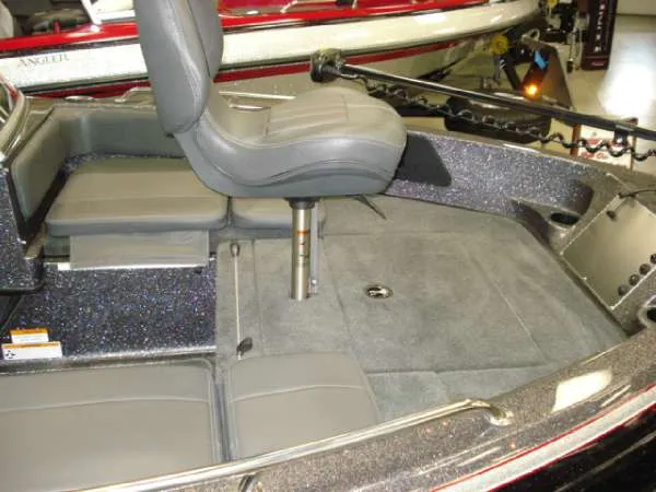 Slide: The Image of Interior of a 2014 Ranger 1850 LS boat with gray seating. - 12