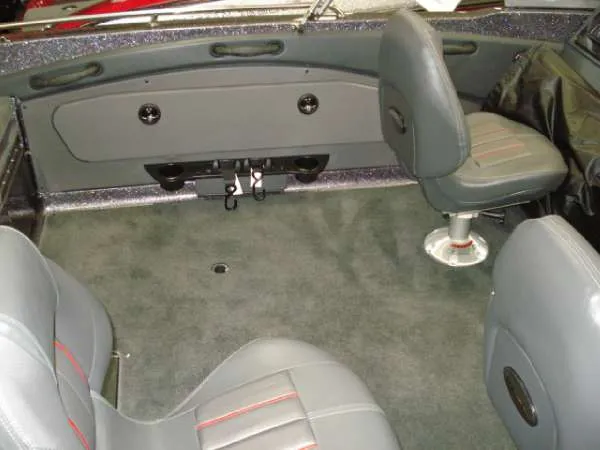 Slide: The Image of Interior of a 2014 Ranger 1850 LS boat with gray seating. - 15