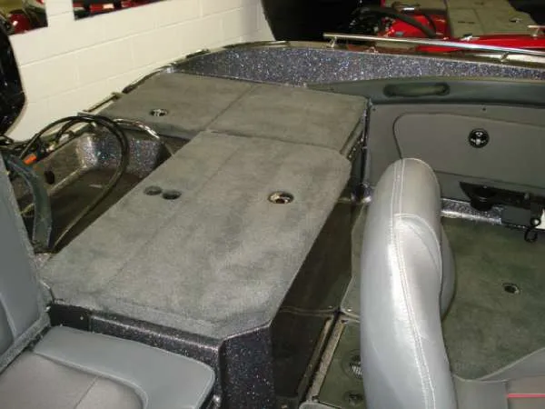 Slide: The Image of Interior of a 2014 Ranger 1850 LS boat with gray seating. - 17