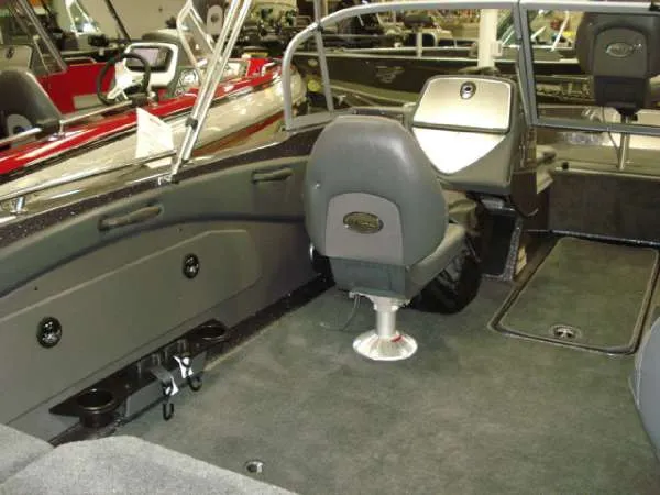 Slide: The Image of Interior of a 2014 Ranger 1850 LS boat with gray seating. - 19