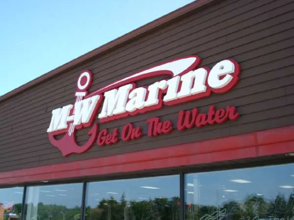 Slide: The Image of M-W Marine building with slogan "Get On The Water." - 23