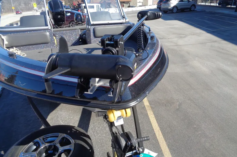 Slide: The Image of 2014 Ranger 1850 LS boat with trolling motor in parking lot. - 27