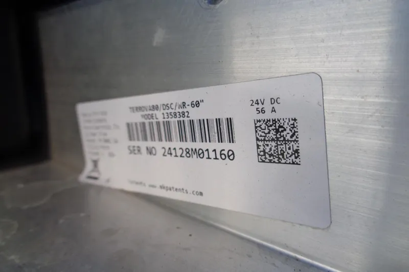 Slide: The Image of Label on a 2014 Ranger 1850 LS, showing serial number and QR code. - 28