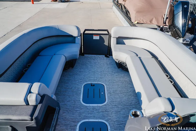 Slide: The Image of 2026 Bennington 24MSB pontoon boat interior with spacious seating at Lake Norman Marina. - 12