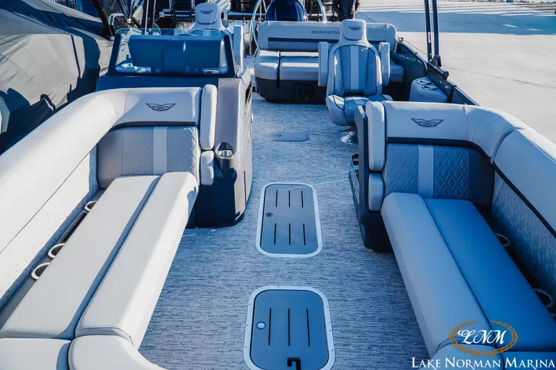 Slide: The Image of Luxurious interior of 2026 Bennington 24MSB pontoon boat at Lake Norman Marina. - 13