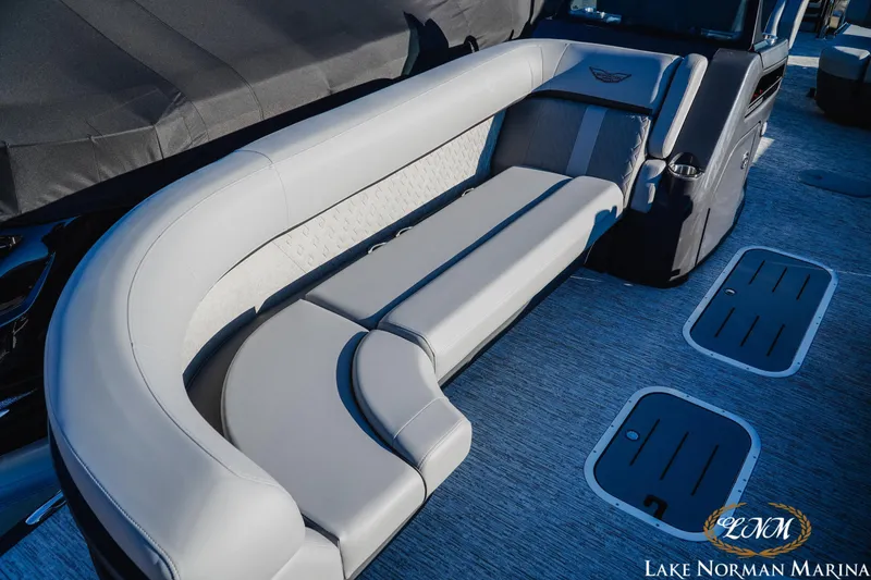Slide: The Image of 2026 Bennington 24MSB boat interior with luxurious seating at Lake Norman Marina. - 15