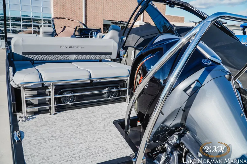 Slide: The Image of 2026 Bennington 24MSB pontoon boat with sleek seating and modern design at Lake Norman Marina. - 5