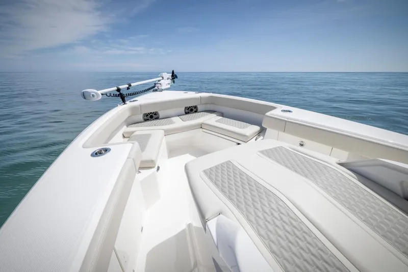 Slide: The Image of Manufacturer Provided Image: 2026 Solace 30 HCS boat with spacious seating on calm ocean waters. - 3