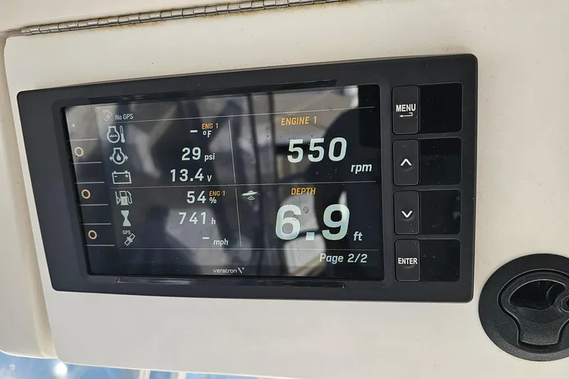 Slide: The Image of Display panel on 2004 Luhrs 34 Convertible showing engine and depth metrics. - 18