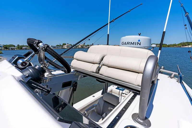 Slide: The Image of Manufacturer Provided Image: Helm of 2026 Solace 32 CS boat with Garmin equipment on a sunny day. - 5