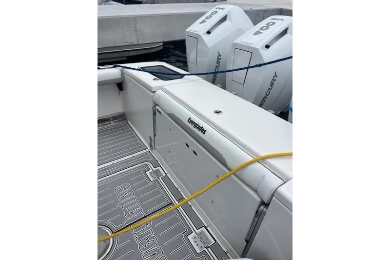 Slide: The Image of 2018 Everglades 435 Center Console boat with Mercury engines docked. - 31