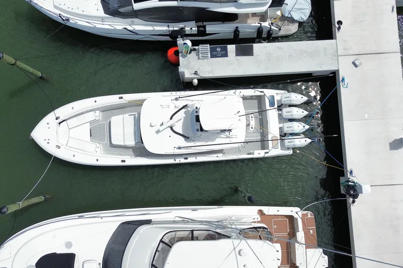 Slide: The Image of Aerial view of 2018 Everglades 435 Center Console docked at marina. - 8