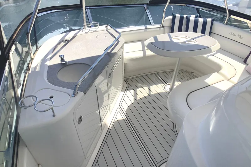 Slide: The Image of Luxurious 2007 Sea Ray 52 Sedan Bridge yacht interior with seating and table. - 16