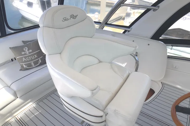 Slide: The Image of Luxurious white captain's chair on 2007 Sea Ray 52 Sedan Bridge yacht. - 17