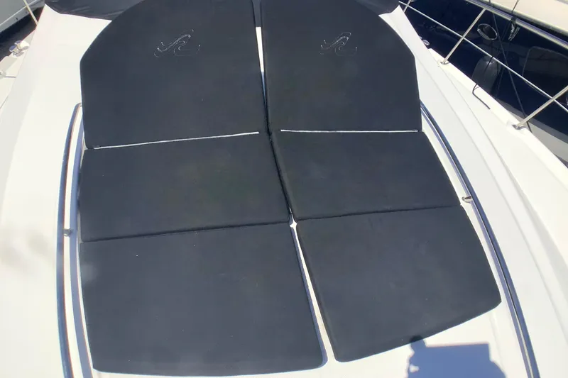 Slide: The Image of Sunpads on 2007 Sea Ray 52 Sedan Bridge yacht deck. - 25