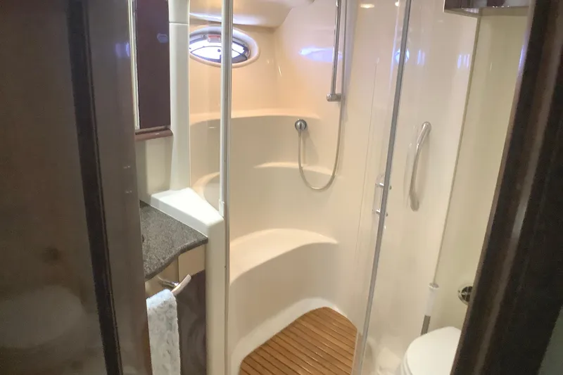 Slide: The Image of Bathroom interior of 2007 Sea Ray 52 Sedan Bridge yacht, featuring shower and sink. - 36