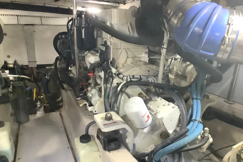 Slide: The Image of Engine room of a 2007 Sea Ray 52 Sedan Bridge yacht, showcasing mechanical components. - 40