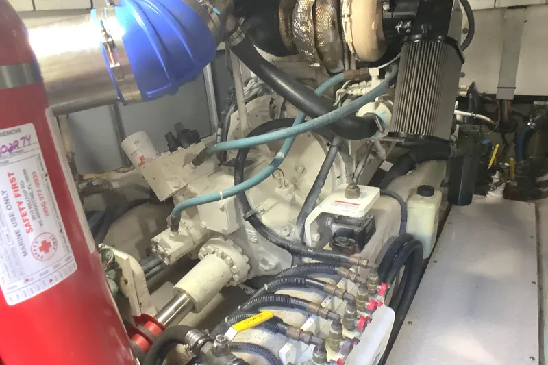 Slide: The Image of Engine room of a 2007 Sea Ray 52 Sedan Bridge yacht, showcasing mechanical components. - 42