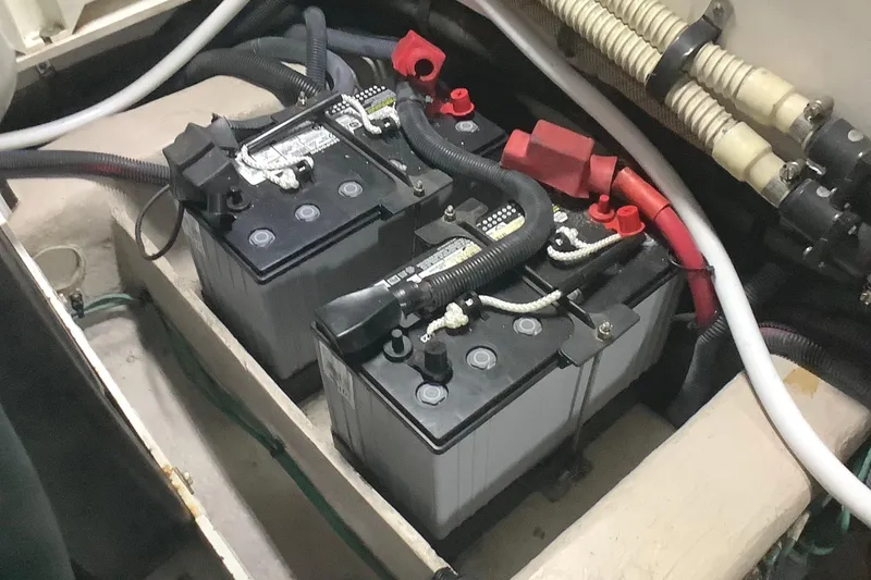 Slide: The Image of Batteries in a 2007 Sea Ray 52 Sedan Bridge engine compartment. - 44