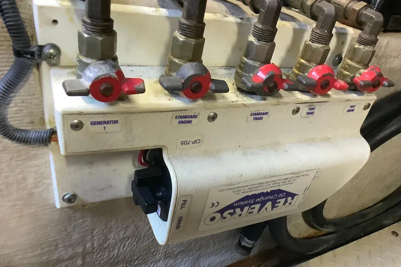 Slide: The Image of Oil change system panel on a 2007 Sea Ray 52 Sedan Bridge yacht. - 46