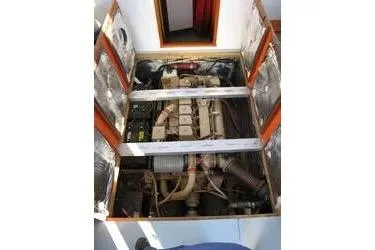 Slide: The Image of Engine compartment of a 1988 Duffy 31 Lobster Boat, showcasing mechanical components. - 15