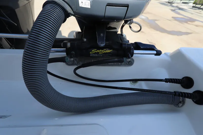 Slide: The Image of Hydraulic steering system on a 2009 Century 2400 Walk-Around boat. - 18