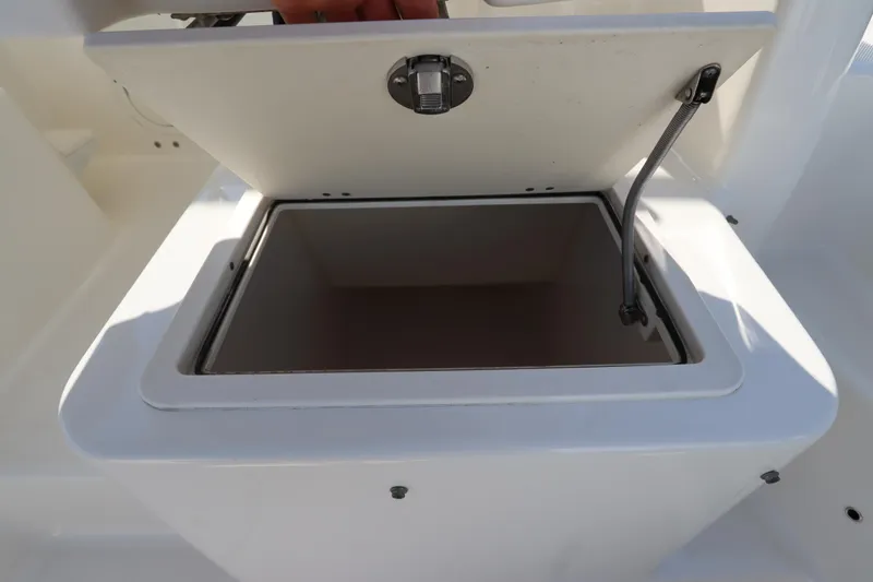 Slide: The Image of Open storage compartment on 2009 Century 2400 Walk-Around boat. - 24