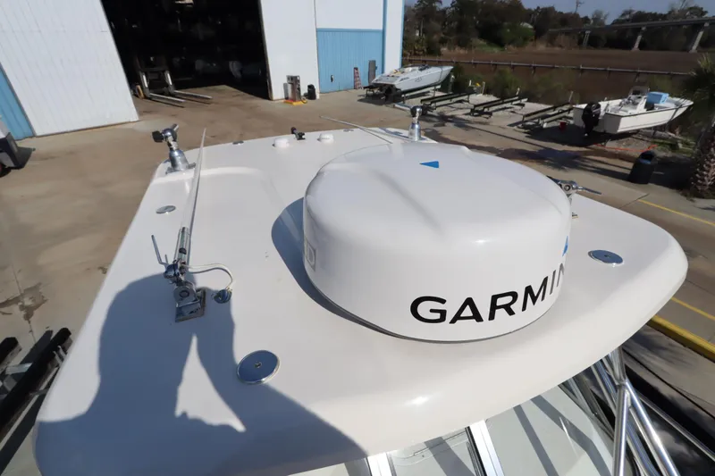 Slide: The Image of 2009 Century 2400 Walk-Around boat with Garmin radar - 42