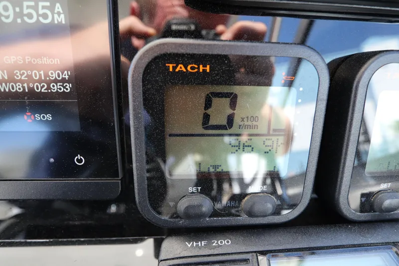 Slide: The Image of Digital tachometer and GPS display on a 2009 Century 2400 Walk-Around boat. - 56