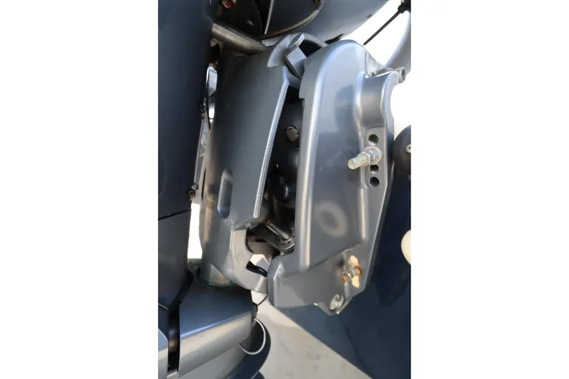 Slide: The Image of Close-up of a 2009 Century 2400 Walk-Around boat engine component. - 71