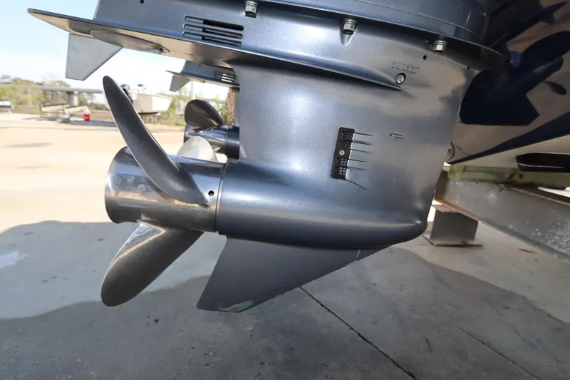 Slide: The Image of Close-up of a 2009 Century 2400 Walk-Around boat propeller and motor. - 72