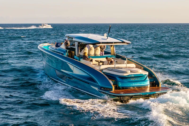 Slide: The Image of 2024 Solaris Power 52 Open yacht cruising on the ocean, showcasing luxury and elegance. - 2