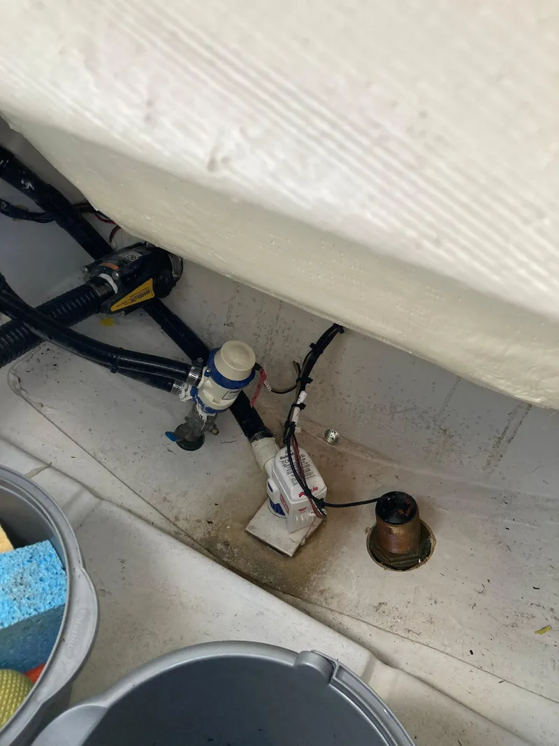 Slide: The Image of 2023 Sportsman Open 242 Center Console boat interior wiring and components. - 25