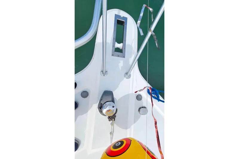 Slide: The Image of Bow view of a 2000 Ocean Yachts 40 Super Sport, featuring deck equipment and railing. - 13