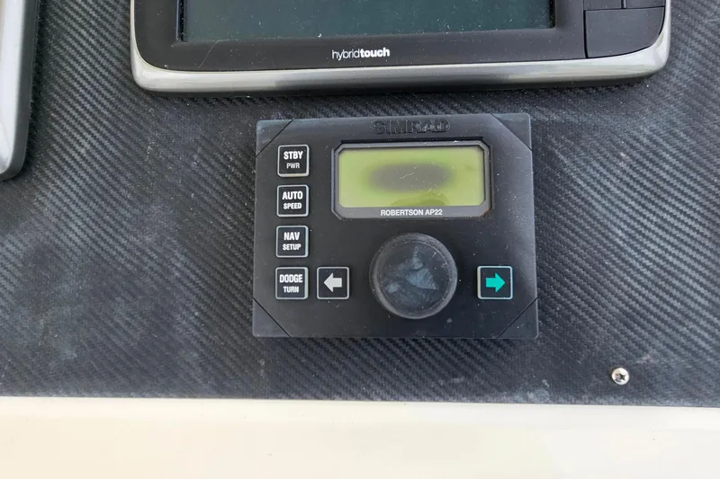 Slide: The Image of Control panel of a 2000 Ocean Yachts 40 Super Sport with navigation display. - 24