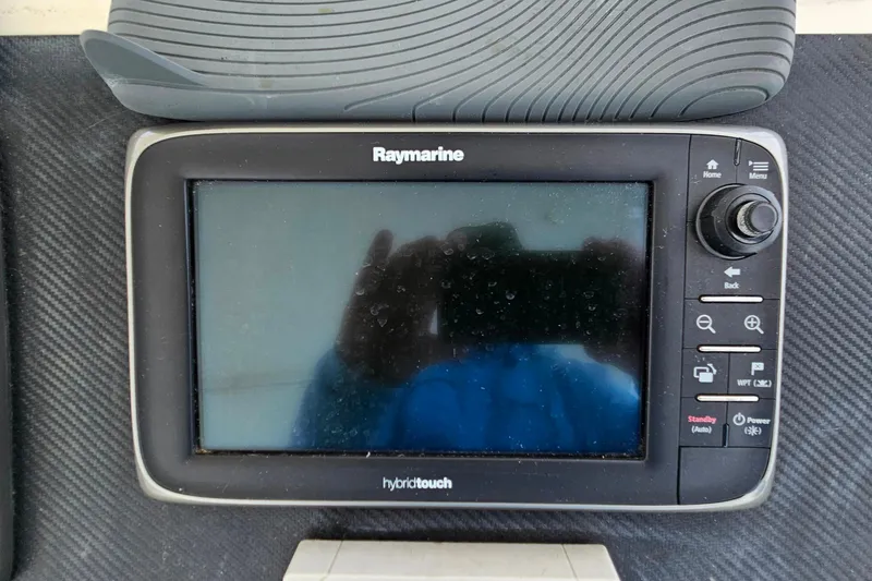 Slide: The Image of Raymarine HybridTouch display on 2000 Ocean Yachts 40 Super Sport boat dashboard. - 25