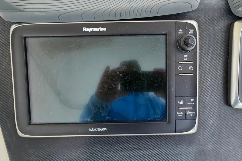 Slide: The Image of Raymarine HybridTouch display on 2000 Ocean Yachts 40 Super Sport dashboard. - 26
