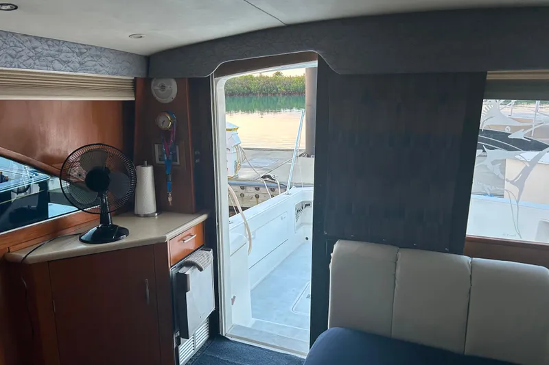 Slide: The Image of Interior view of 2000 Ocean Yachts 40 Super Sport, featuring cabin and deck access. - 39