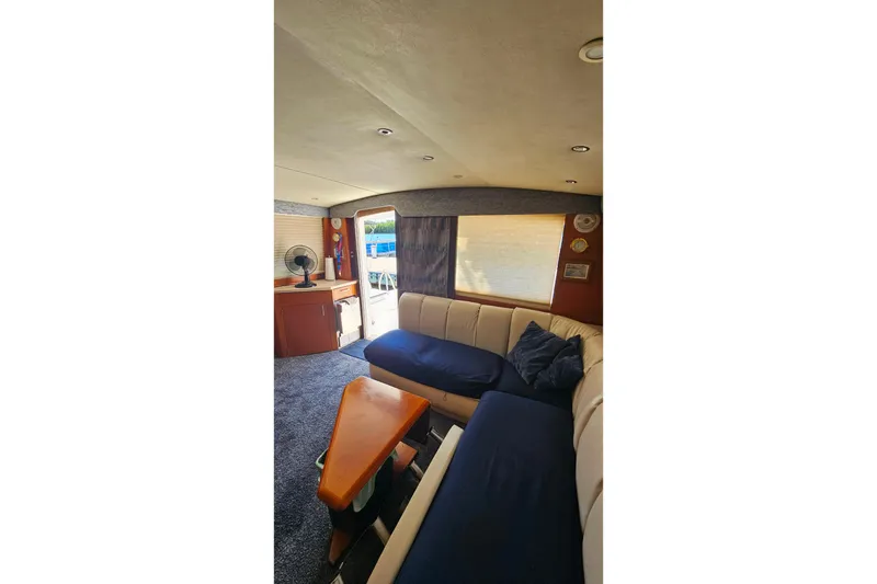 Slide: The Image of Interior of 2000 Ocean Yachts 40 Super Sport with cozy seating and modern decor. - 45