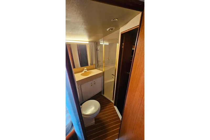 Slide: The Image of Bathroom interior of 2000 Ocean Yachts 40 Super Sport with shower and vanity. - 62