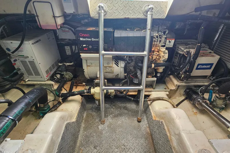 Slide: The Image of Engine room of a 2000 Ocean Yachts 40 Super Sport with marine generator and equipment. - 64