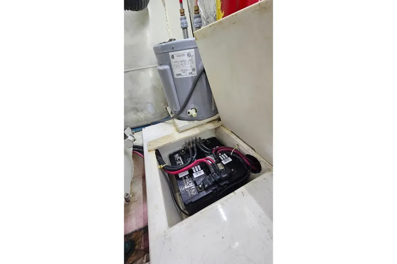 Slide: The Image of Battery compartment of a 2000 Ocean Yachts 40 Super Sport boat. - 74