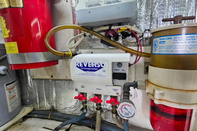 Slide: The Image of Engine room of 2000 Ocean Yachts 40 Super Sport with Reverso oil change system. - 76