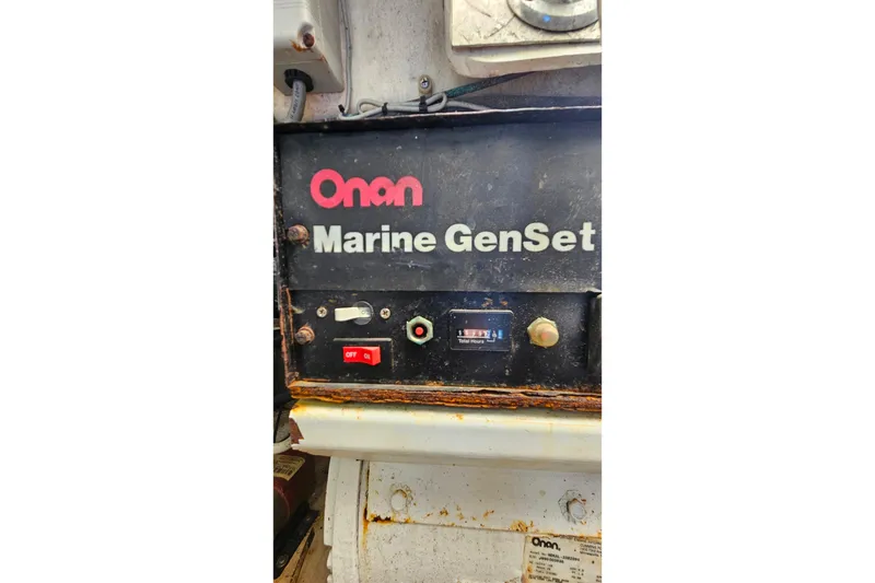 Slide: The Image of Onan Marine GenSet control panel on 2000 Ocean Yachts 40 Super Sport. - 81