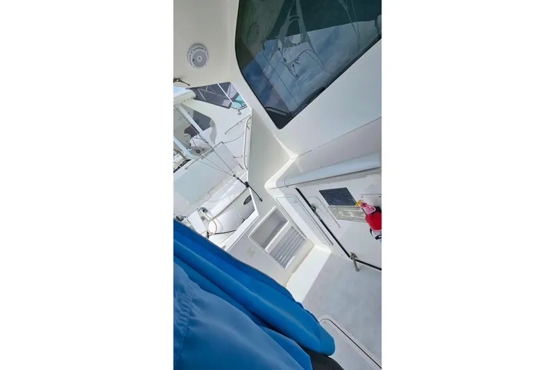 Slide: The Image of Interior view of a 2000 Ocean Yachts 40 Super Sport, showcasing cabin details and equipment. - 92