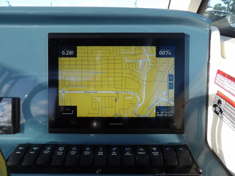 Slide: The Image of Garmin navigation display on 2022 Stingray 269 DC boat dashboard. - 29