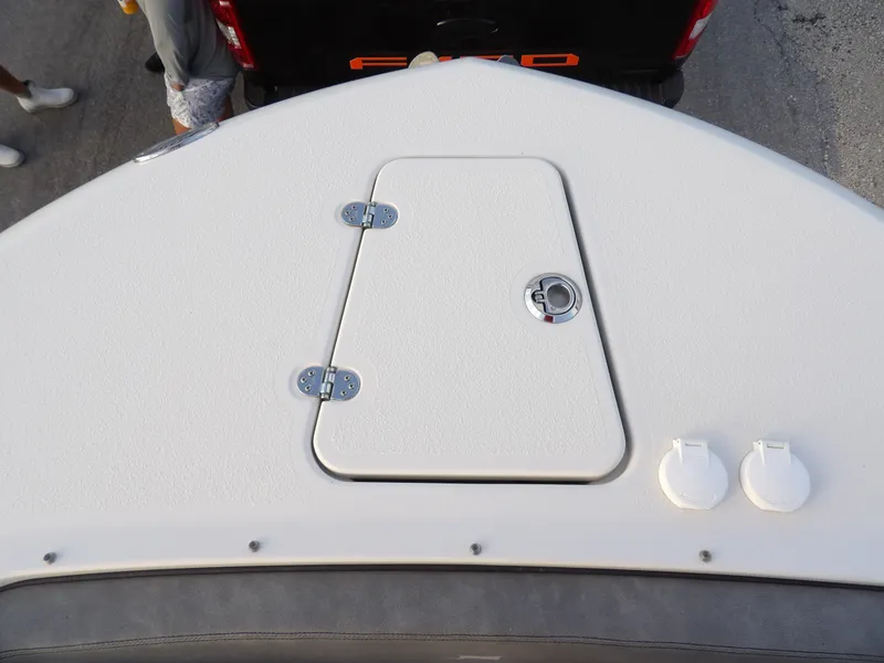 Slide: The Image of Bow view of 2022 Stingray 269 DC boat with hatch and fittings. - 48