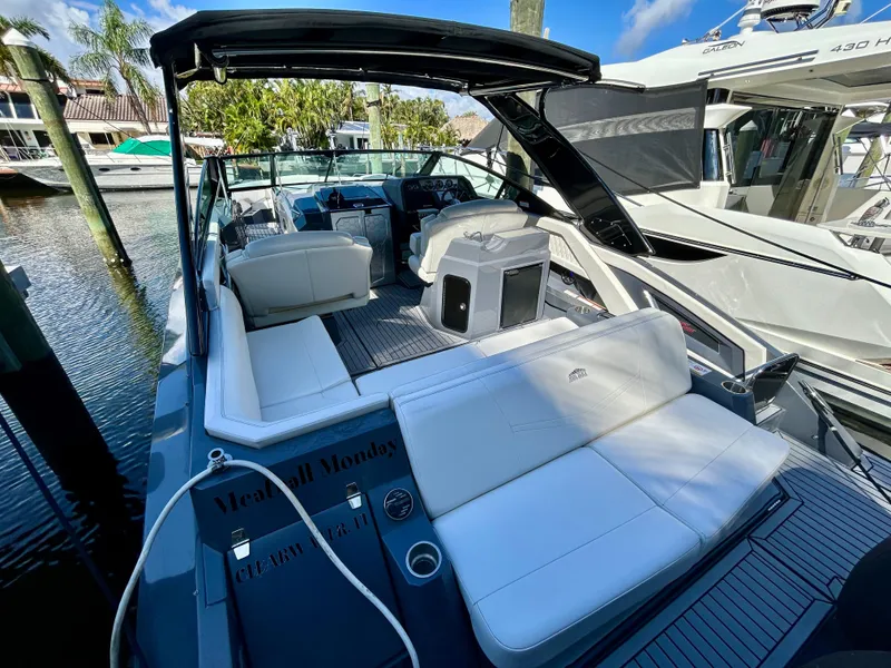 Slide: The Image of 2021 Cruisers Yachts 338 South Beach Edition Bow Rider with luxurious seating and sleek design. - 36