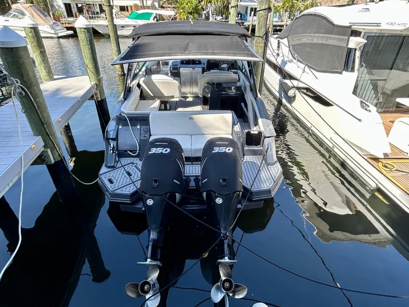 Slide: The Image of 2021 Cruisers Yachts 338 South Beach Edition Bow Rider docked with twin 350 engines. - 40